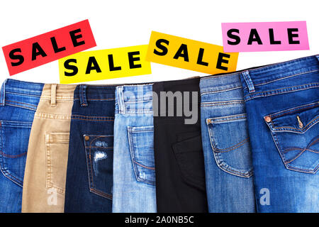 Jeans Of Different Colors Isolated On White Background Space For Text Stock Photo Alamy