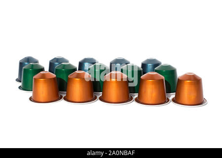 Coffee capsules on a white background isolated closeup in tree lines Stock Photo