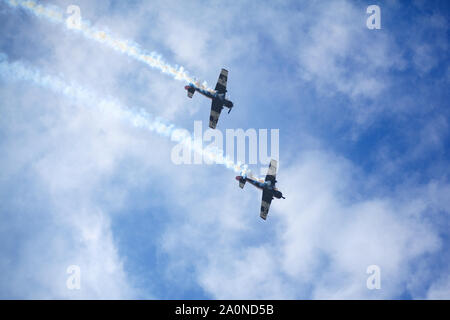 Novosibirsk, Russia, July 31, 2016, Mochishche airfield, local air show, two Yak-52, aerobatic team 'Open Sky', Barnaul, close up Stock Photo