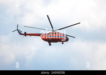 Novosibirsk, Russia, July 31, 2016, Mochishche airfield, local air show, orange helicopter Mi-8 Stock Photo