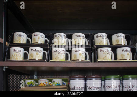 JULY 18, 2019-HO CHI MINH CITY VIETNAM : Souvenir mugs sold at a starbucks store in Vietnam. Stock Photo