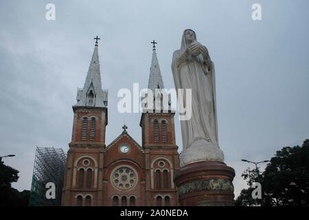 Saigon Notre-Dame Cathedral Basilica (Basilica of Our Lady of The Immaculate Conception) on blue sky background in Ho Chi Minh city, Vietnam. Ho Chi M Stock Photo