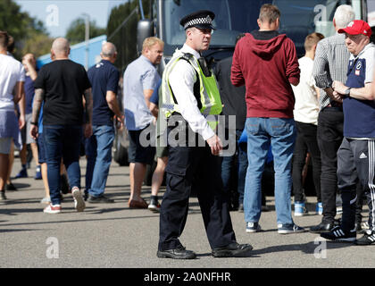 London, UK. 21st Sept 2019. English Championship Football, Millwall Football Club versus Queens Park Rangers; Police officer patrolling outside The Den Stadium before kick off as the QPR team bus arrives at The Den Stadium - Strictly Editorial Use Only. No use with unauthorized audio, video, data, fixture lists, club/league logos or 'live' services. Online in-match use limited to 120 images, no video emulation. No use in betting, games or single club/league/player publications Credit: Action Plus Sports Images/Alamy Live News Credit: Action Plus Sports Images/Alamy Live News Credit: Action Pl  Stock Photo