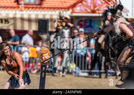 Equestrienne Stunt Shows team at National Country Show Live, Chelmsford, Essex, UK. Female horse riding and gladiatorial display Stock Photo