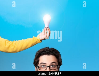 man having a good idea, image over blue background Stock Photo