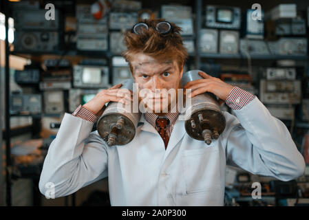 Scientist holds radiation devices in his hands Stock Photo