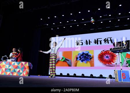 (190921) -- HEFEI, Sept. 21, 2019 (Xinhua) -- Performers from Guangdong Science Center stage a science show at the University of Science and Technology of China in Hefei, east China's Anhui Province, Sept. 21, 2019. A joint scientific experiment performance was staged here by groups from all over the country to impart scientific knowledge and promote the spirit of science on Saturday. (Xinhua/Zhang Duan) Stock Photo