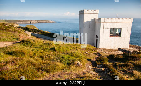 Holyhead, Wales, UK - Sun shines on Ellin's Tower, on the clifftops of South Stack at Holyhead in North Wales. Stock Photo