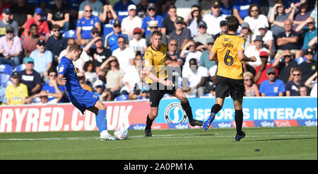London UK 21 September 2019 - Marcus Forss of AFC Wimbledon (left) fires in their first goal during the Sky Bet League One football match between AFC Wimbledon and Bristol Rovers at the Cherry Red Records Stadium  - Editorial use only. No merchandising. For Football images FA and Premier League restrictions apply inc. no internet/mobile usage without FAPL license - for details contact Football Dataco . Credit : Simon Dack TPI / Alamy Live News Stock Photo