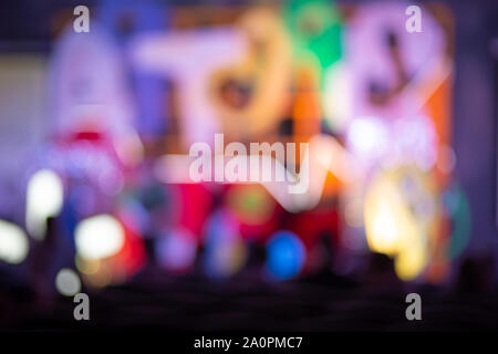 Blurry stage background. Bokeh lighting in concert with audience Stock Photo