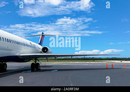 Cozumel, Mexico – July 19, 2016: An American plane Awaits Passengers in Cozumel Mexico. Stock Photo