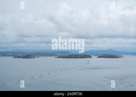 Tiny islands in the mouth of Bergen harbour, Norway Stock Photo