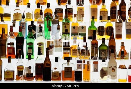 MOSCOW, RUSSIA - November 26, 2015: Various bottles of alcohol sitting on bar shelf Stock Photo