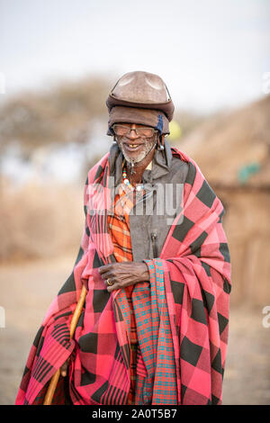 Arusha, Tanzania, 7th September 2019: old maasai man in traditional clothing, Stock Photo