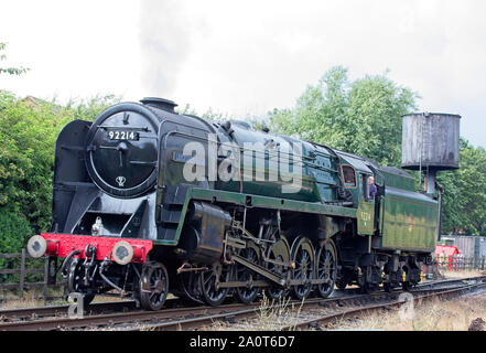 92214 'Leicester City', a BR standard class 9f steam locomotive, near Loughborough station on the Great Central Railway, Leicestershire, England, UK. Stock Photo