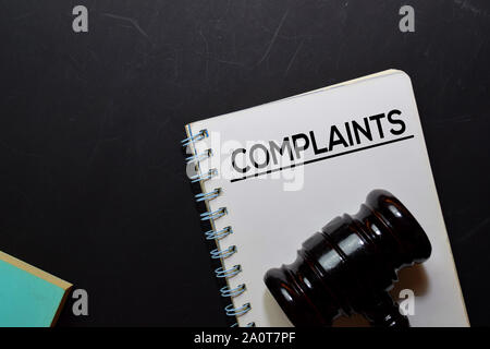 Complaints text on Document and gavel isolated on office desk. Law concept Stock Photo