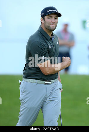 Wentworth Golf Club, Virginia Water, UK. 21 September 2019. Jon Rahm of Spain celebrates after his putt on the 18th hole during Day 3 at the BMW PGA Championship. Editorial use only. Credit: Paul Terry/Alamy. Credit: Paul Terry Photo/Alamy Live News Stock Photo