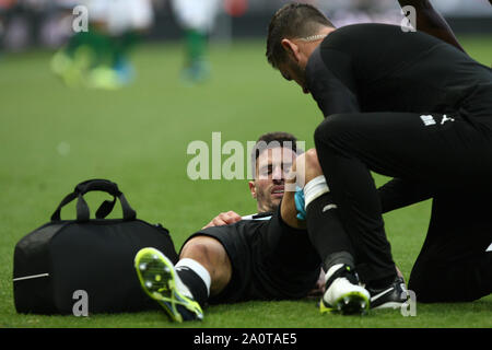 Newcastle, UK. 21st Sep, 2019.  Newcastle United's Fabian Schar is treated for an injury during the Premier League match between Newcastle United and Brighton and Hove Albion at St. James's Park, Newcastle on Saturday 21st September 2019. (Credit: Steven Hadlow | MI News)Photograph may only be used for newspaper and/or magazine editorial purposes, license required for commercial use Credit: MI News & Sport /Alamy Live News Stock Photo