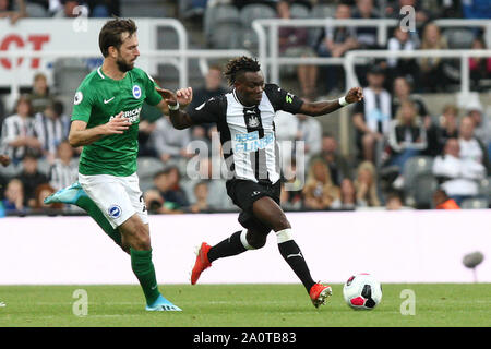 Newcastle, UK. 21st Sep, 2019.  Newcastle United's Christian Atsu competes for the ball with Brighton & Hove Albion's Davy Propper during the Premier League match between Newcastle United and Brighton and Hove Albion at St. James's Park, Newcastle on Saturday 21st September 2019. (Credit: Steven Hadlow | MI News) Photograph may only be used for newspaper and/or magazine editorial purposes, license required for commercial use Credit: MI News & Sport /Alamy Live News