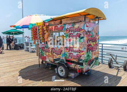 Santa Monica, California USA. May 30, 2019. Fresh fruits canteen on Santa Monica pier, Los Angeles. Blue sky, sunny spring day Stock Photo