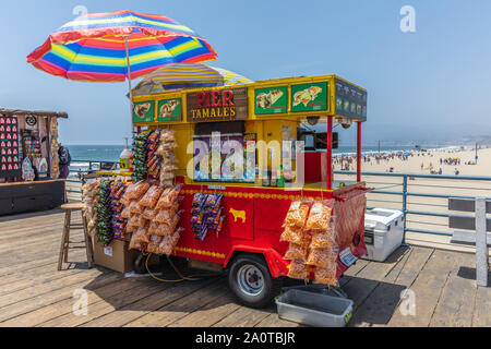 Los Angeles California USA. May 30, 2019. Santa Monica Pier tamales food kiosk wooden pier, blue sky, sunny spring day Stock Photo