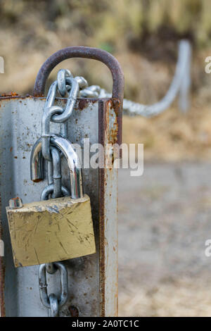 Broken padlock Stock Photo