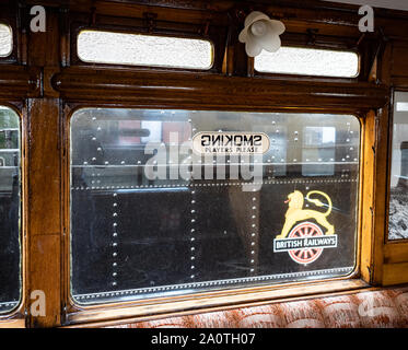 Window of railway carriage with Smoking sign Stock Photo