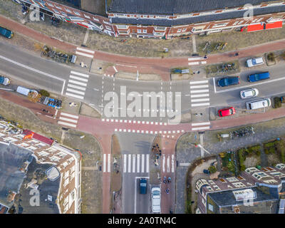 Aerial view of a modern urban intersection at night with contemporary ...