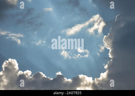 Blue sky showing through break in clouds. Stock Photo