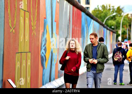 BERLIN, GERMANY - SEPTEMBER 15: Berlin Wall graffiti seen on Saturday, September 21, 2019 Berlin, East Side Gallery, Berlin Wall famous memorial. Stock Photo