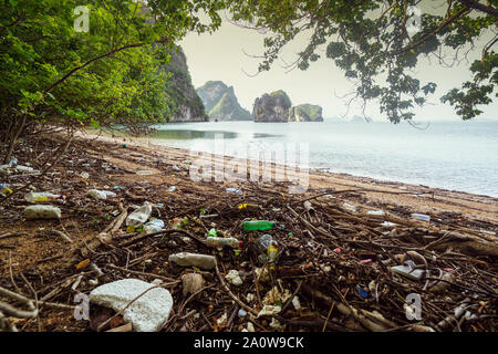 Ocean waste, single use plastic, polystyrene, washed up on the beach of the idyllic Thai islands Krabi Thailand. Stock Photo
