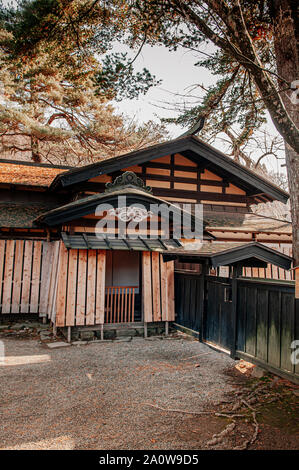 DEC 3, 2018 Kakunodate, Japan - Kakunodate old Samurai town famous vintage Edo houses that became museum with big tree in Akita, Tohoku region Stock Photo