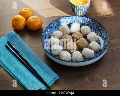Korean traditional food Glutinous rice cake and Sweet pumpkin  sikhye, Pumpkin beverage Stock Photo