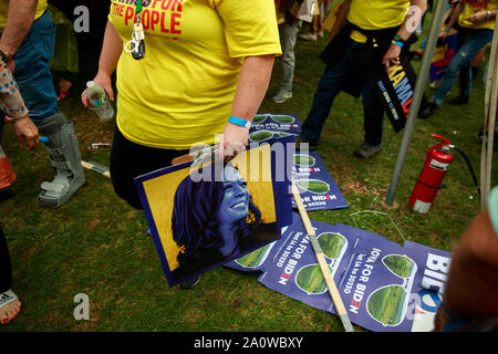 A Kamala Harris supporter carries a sign during the Polk County Steak Fry, Saturday, September 21, 2019 at Water Works Park in Des Moines, Iowa. The steak fry was the largest in Iowa's history and was attended by 12,000 Democrats from around Iowa. The event drew in 17 candidates for the democratic nomination for president of the United States. The Iowa Caucasus are Monday, February 3, 2020 and although not a primary will narrow down the field of candidates for president before the first election primary in the state of New Hampshire. Stock Photo