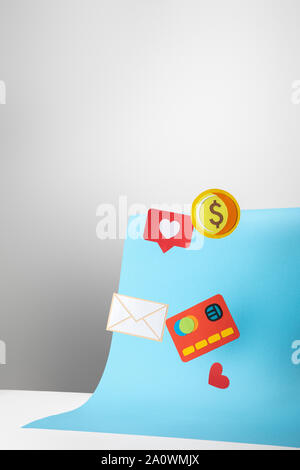 colorful paper icons on gradient background, finance concept Stock Photo