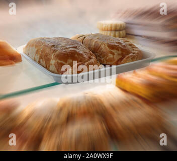 Tempting large pasties in the window of a bakers at St Ives in Cornwall Stock Photo
