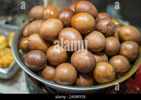 Close-up view of the chinese herbal tea eggs selling in the night market Stock Photo