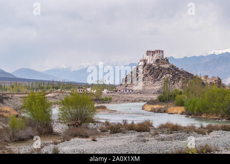 Stakna monastery above Indus river with view of Himalayan mountians located in Leh Ladakh, northern India state of Jammu and Kashmir, India. Stock Photo