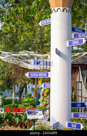 Putrajaya, Malaysia - September 6, 2019 :  Direction signpost to many different places in Selangor at Taman Botani Putrajaya for Visitors at the Royal Stock Photo