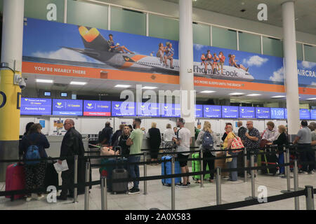 London, United Kingdom - 22 September 2019 . *Permission Granted*. Passengers at Check in counter of Thomas Cook airlines at Gatwick Airport as the tour operator faces  financial difficulties with 150,000 passengers and holidaymakers are stranded abroad. Thomas Cook needs to raise another £200million to avoid going into administration  Credit: amer ghazzal/Alamy Live News Stock Photo