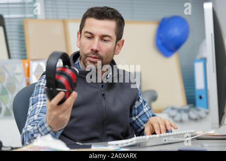 construction supervisor planning new project in office Stock Photo