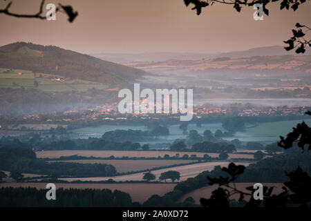 Morning mist over Ludlow and the Teme Valley, seen from Knowbury, near Ludlow, Shropshire Stock Photo