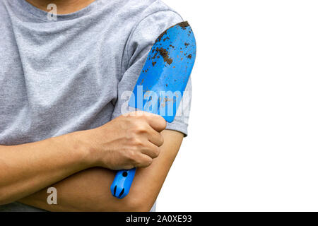 Gardener holding garden trowel and cross one's arm. Isolated on white background and clipping path. Concept of agriculture. Closeup and copy space for Stock Photo