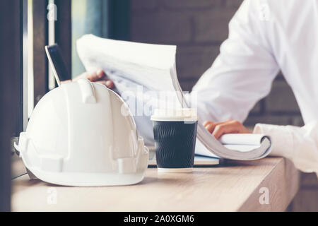 Smart engineer working outdoor at the coffee shop. Stock Photo