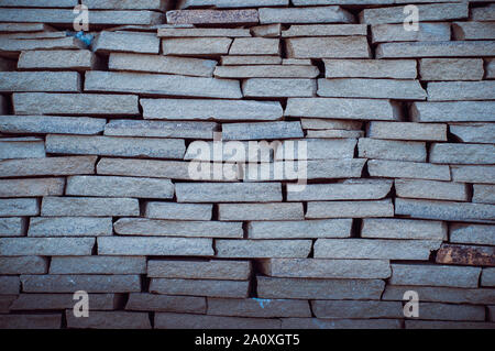 Background wall small light brown textural decorative brick Stock Photo