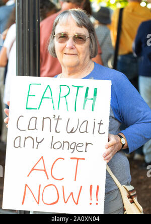 A senior citizen protests at the International Climate Justice Rally in Asheville, NC, USA. Stock Photo
