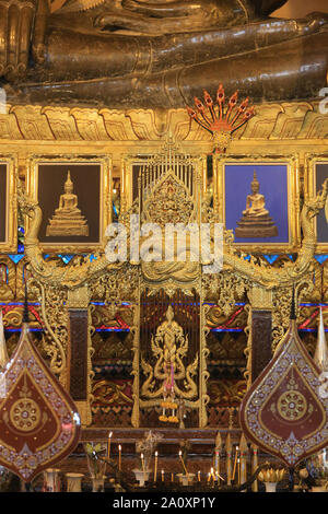 Bouddha. Vat Ong Teu. Wat Ong Teu Mahawihan. Vientiane. Laos. / Details of the golden pedestal. Buddha. Vat Ong Teu. Wat Ong Teu Mahawihan. Vientiane. Stock Photo