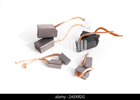 Brush sets for alternator and starter. components. Automotive electric spare parts. Stock Photo