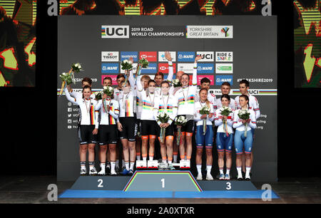 Netherlands (centre) Germany (left) and Great Britain on the podium after the 2019 UCI World Road Championship Team Time Trial Mixed Relay through Harrogate. Stock Photo