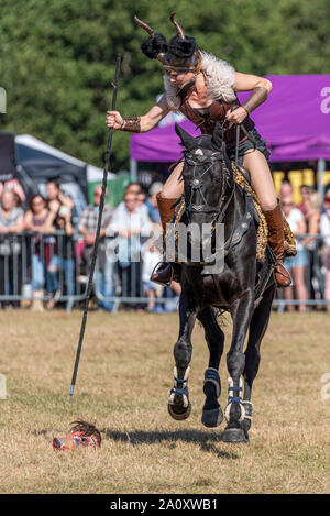 Equestrienne Stunt Shows horse display at the National Country Show Live at Hylands Park, Chelmsford, Essex, UK. Horse event team Stock Photo